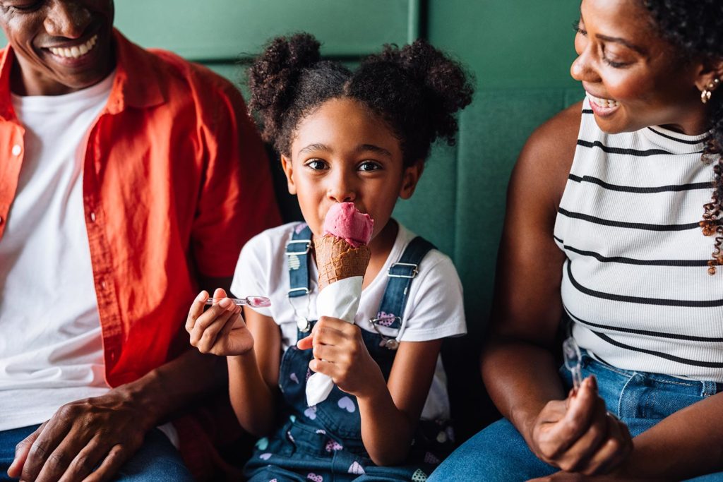 girl-with-ice-cream-cone-and-parents
